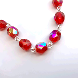 Armbnd med glasperler, kors og mariamedaljon